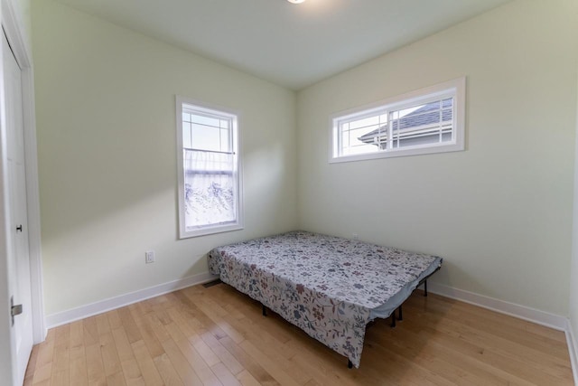 bedroom featuring light wood-type flooring