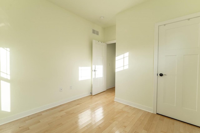 unfurnished bedroom with light hardwood / wood-style flooring