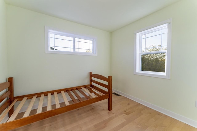 bedroom featuring light hardwood / wood-style flooring