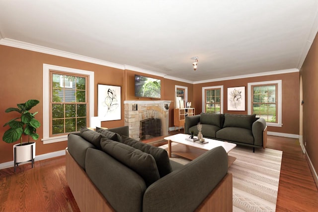 living room with ornamental molding, wood-type flooring, and a stone fireplace