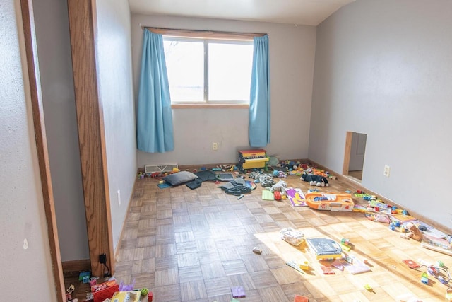 empty room featuring parquet flooring