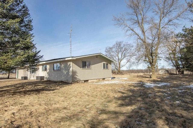 view of property exterior with cooling unit