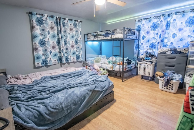 bedroom featuring ceiling fan and hardwood / wood-style floors