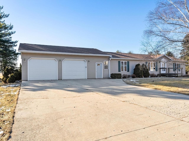 single story home with a garage