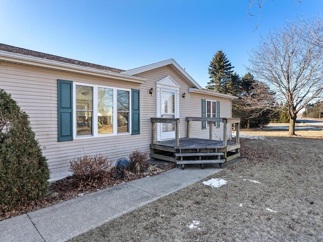 view of front of property with a deck