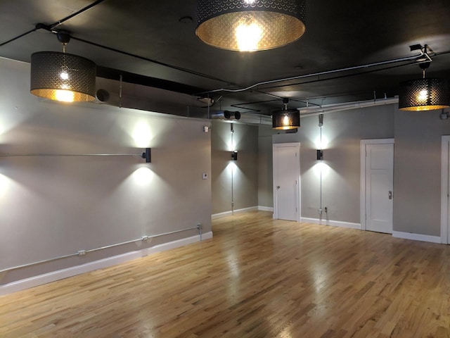 basement featuring wood-type flooring