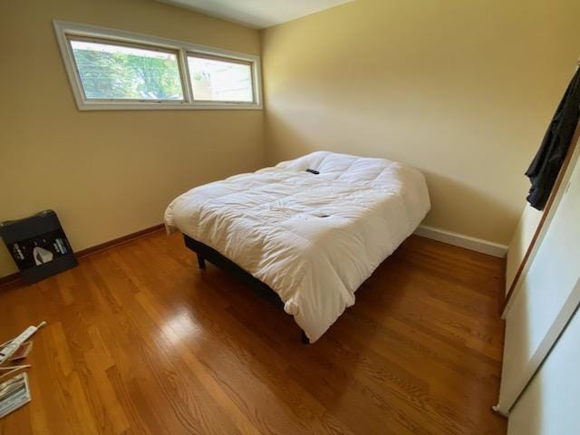 bedroom featuring hardwood / wood-style flooring