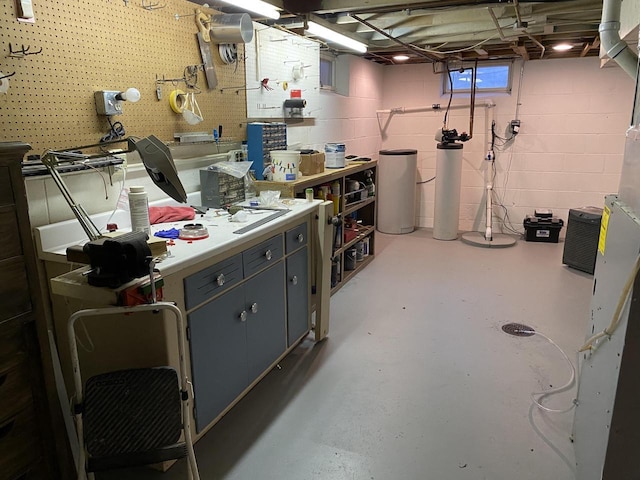 basement with a workshop area