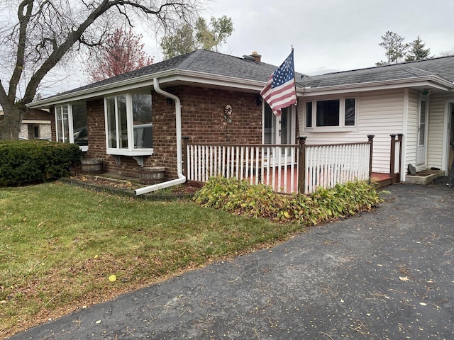 view of home's exterior featuring a yard