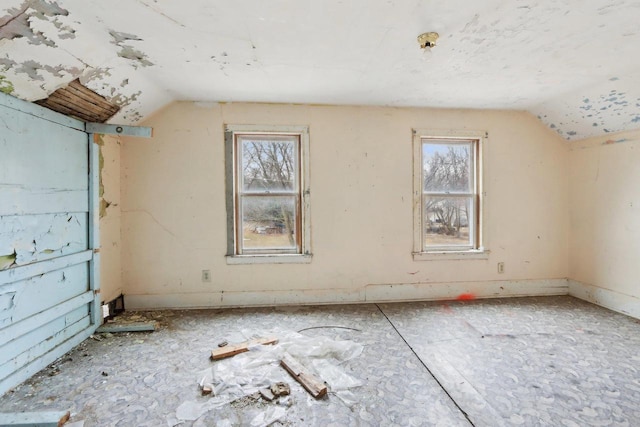 bonus room featuring lofted ceiling