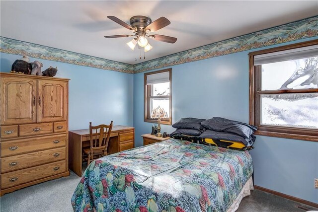 carpeted bedroom with ceiling fan