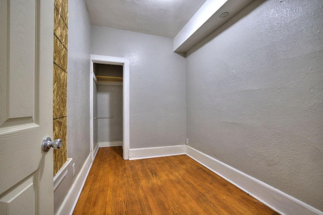 unfurnished room featuring hardwood / wood-style floors