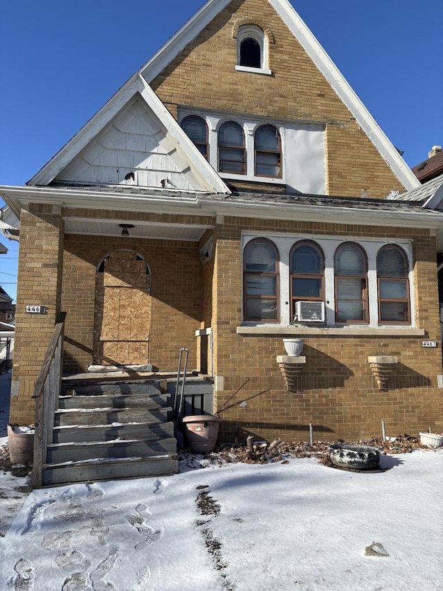 view of front of property with cooling unit