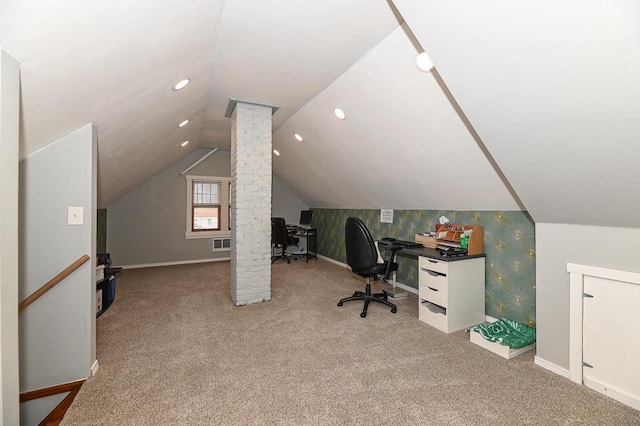 home office with light carpet, lofted ceiling, and ornate columns