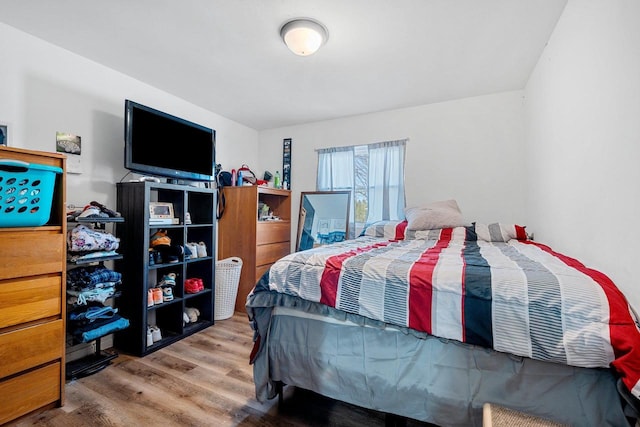 bedroom featuring hardwood / wood-style floors