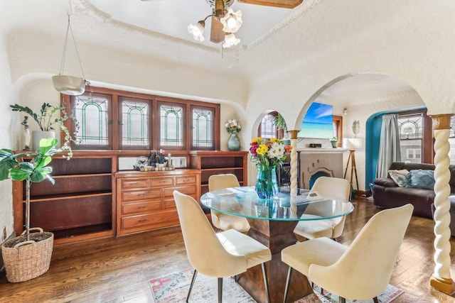 dining space featuring ceiling fan and wood-type flooring