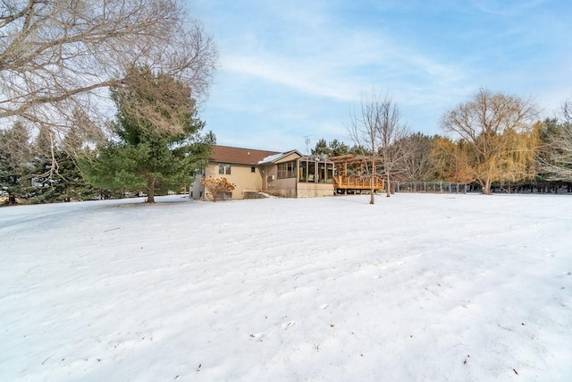 view of yard layered in snow