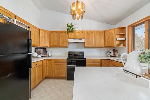 kitchen featuring lofted ceiling, decorative light fixtures, a chandelier, and black appliances