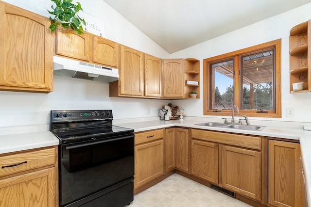 kitchen featuring lofted ceiling, black range with electric stovetop, and sink