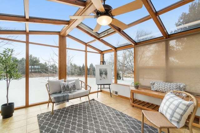 sunroom / solarium featuring vaulted ceiling and ceiling fan