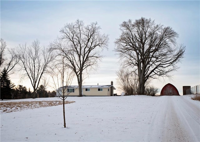 view of yard covered in snow