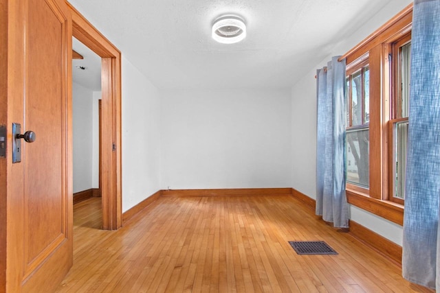 empty room featuring light hardwood / wood-style flooring