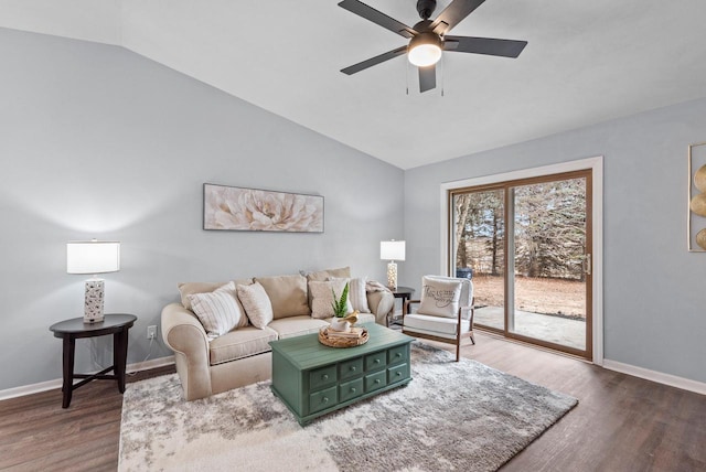 living room featuring lofted ceiling, dark hardwood / wood-style floors, and ceiling fan