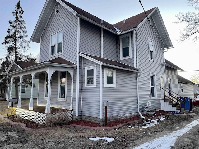 view of home's exterior featuring covered porch