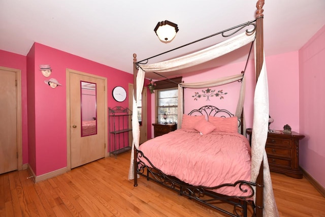 bedroom featuring light wood-type flooring