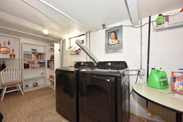 laundry room featuring washer and clothes dryer