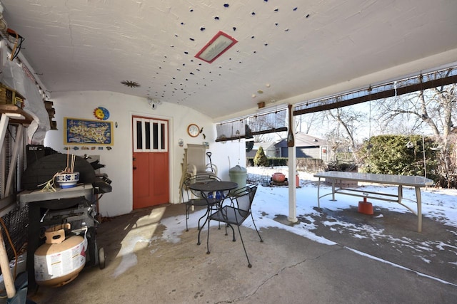 view of snow covered patio