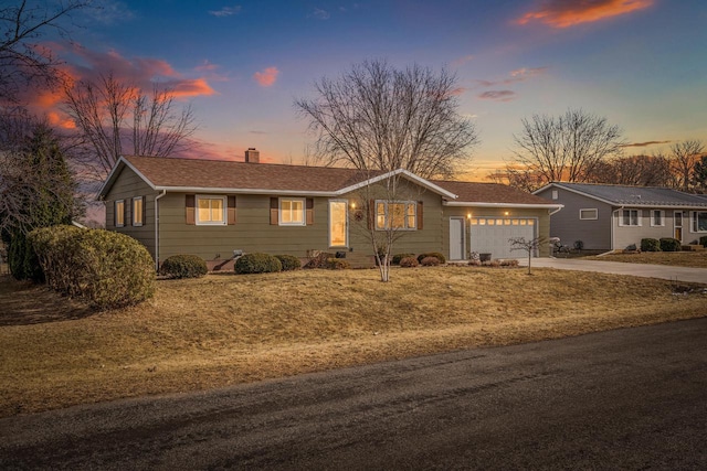 ranch-style home with a garage