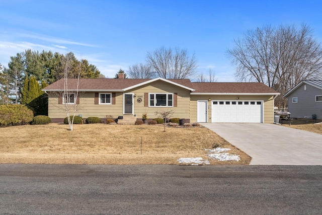 ranch-style house with a garage and cooling unit