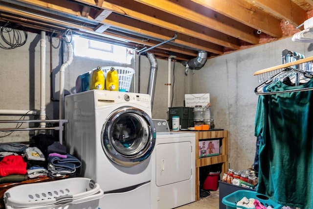 washroom with washing machine and dryer