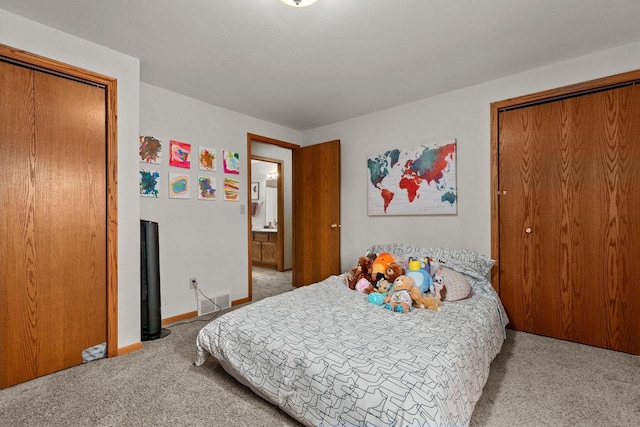 bedroom featuring light colored carpet