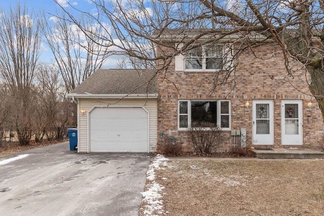 view of front of home with a garage