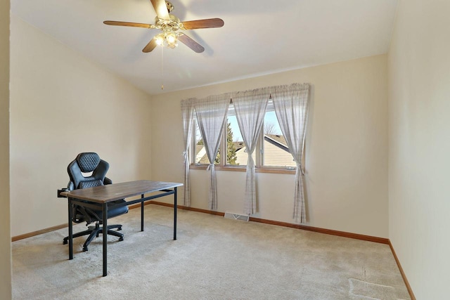 office area featuring light colored carpet and ceiling fan