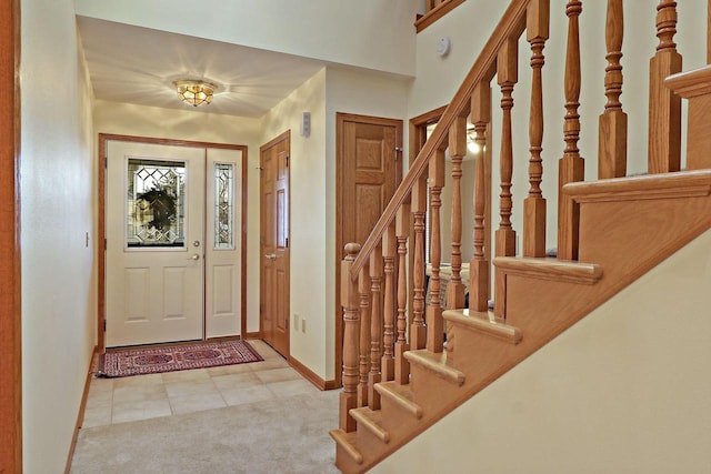 entryway featuring light tile patterned flooring