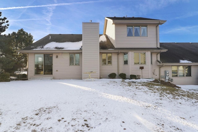 view of snow covered property