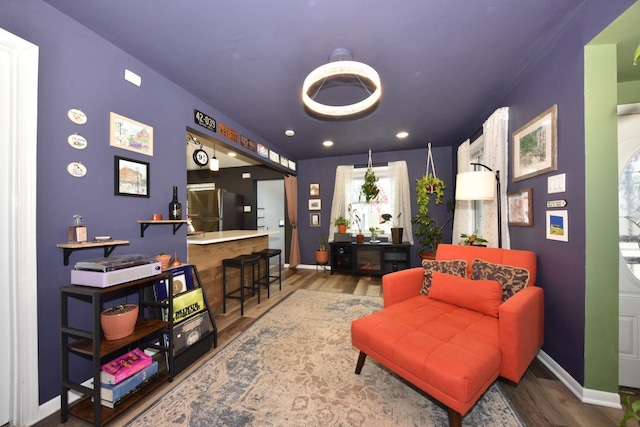 living area featuring hardwood / wood-style flooring