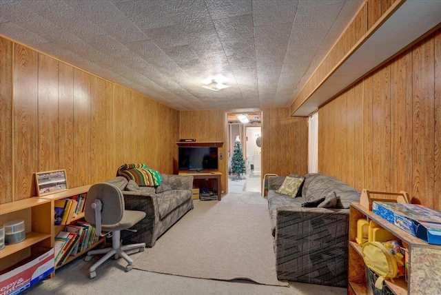 living room with wooden walls and carpet floors