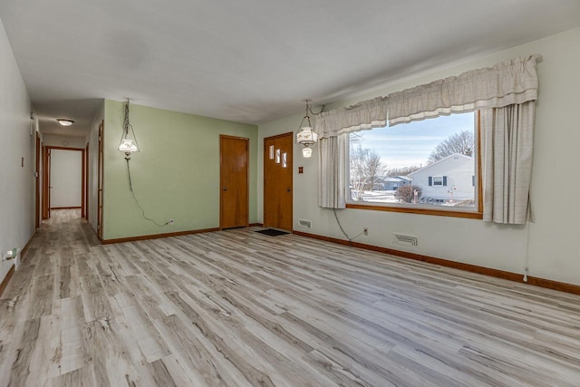 empty room featuring light hardwood / wood-style flooring