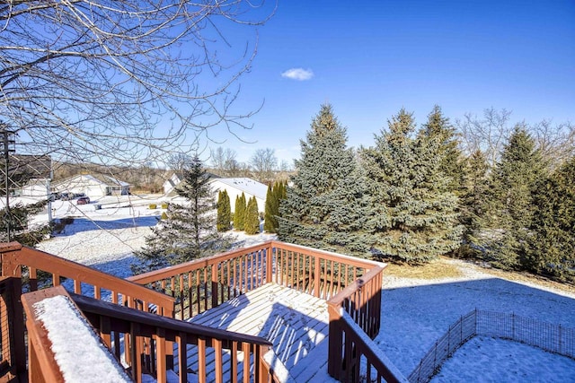 view of snow covered deck