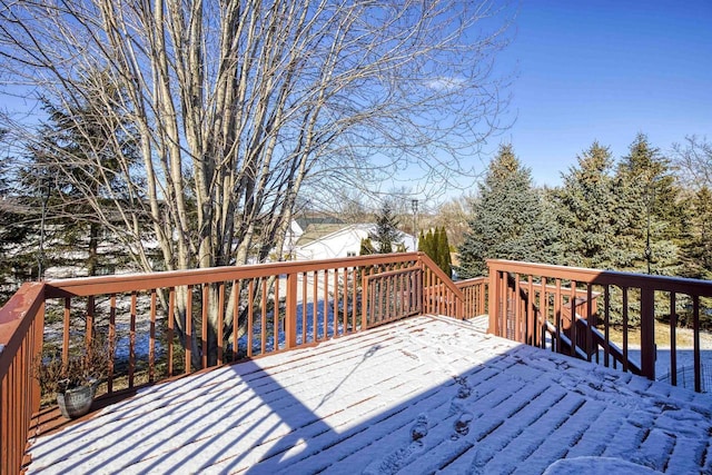 view of snow covered deck