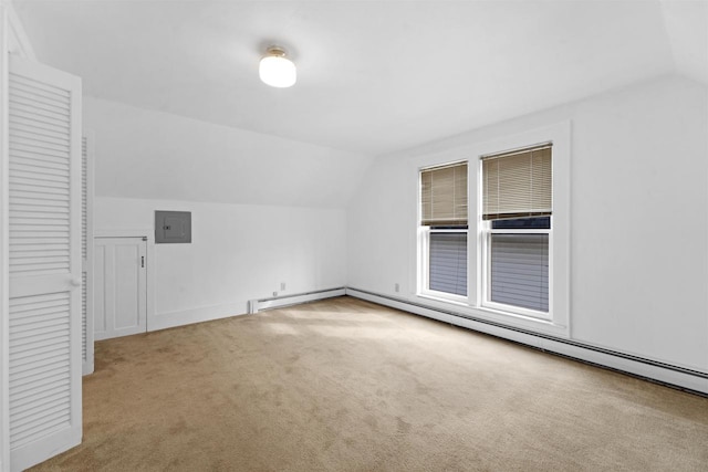 additional living space with lofted ceiling and carpet flooring