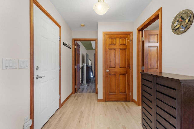 hall featuring light hardwood / wood-style flooring