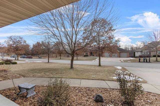 view of yard with a garage