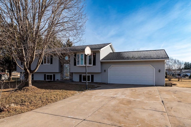 split foyer home featuring a garage