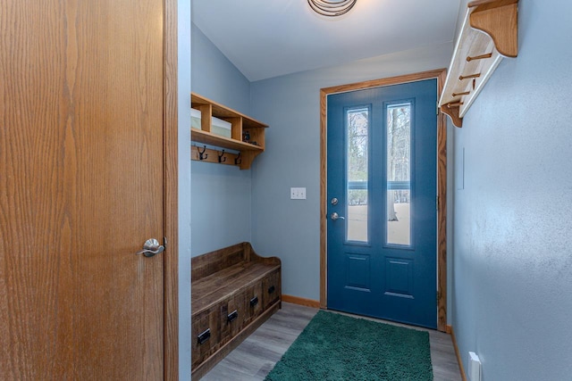 mudroom with light hardwood / wood-style flooring