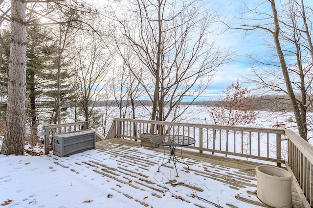 view of snow covered deck